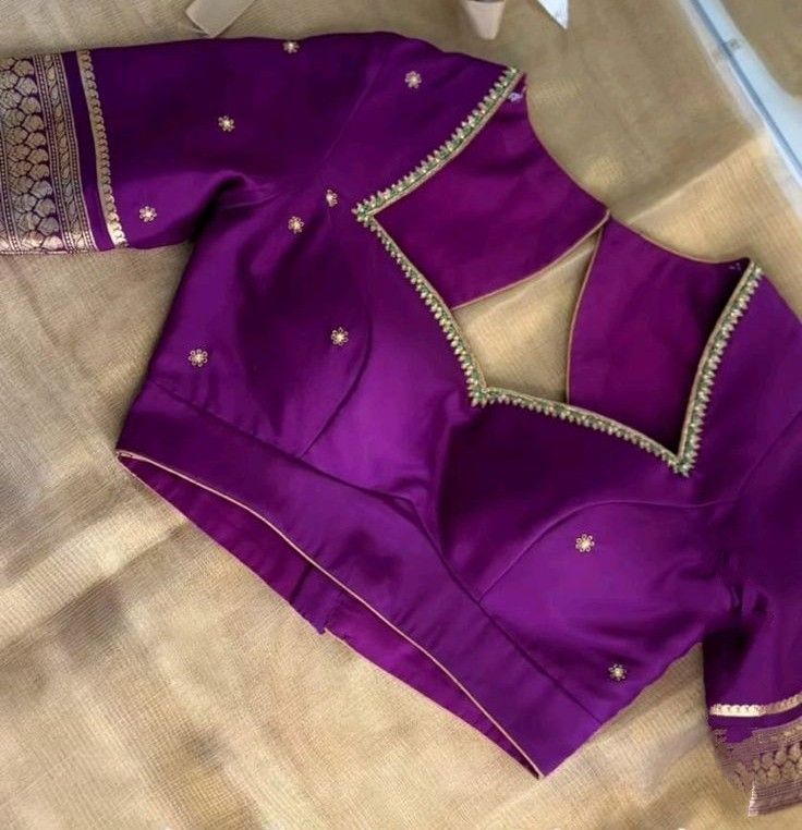 Bridal blouse design in purple with detailed neckline work