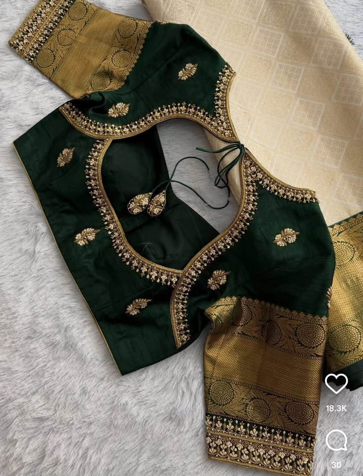 Bridal blouse design in green with gold sleeve work