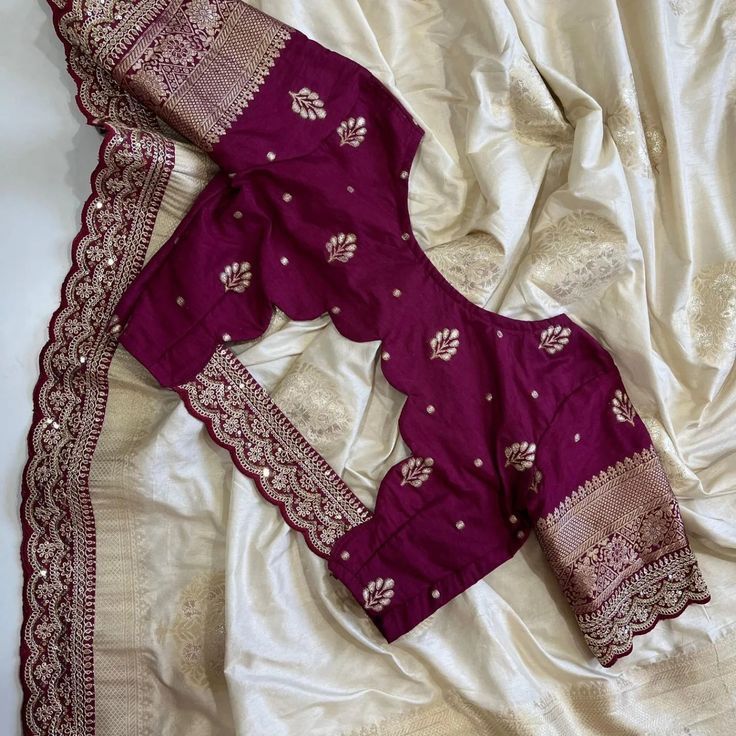 Festive wear blouse design with rich embroidery and border work
