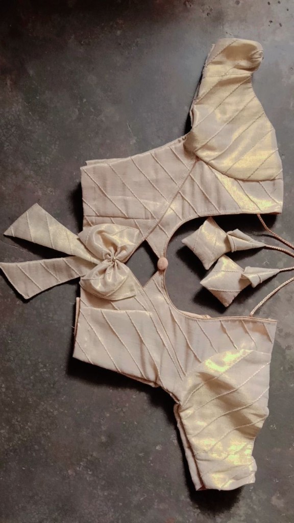 Festive wear blouse design with diagonal pattern and bow detail