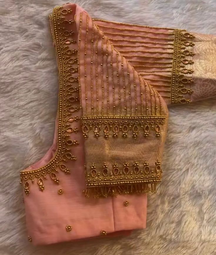 Light peach blouse with gold Aari beaded U-neckline, fringed bead drops and detailed sleeve borders